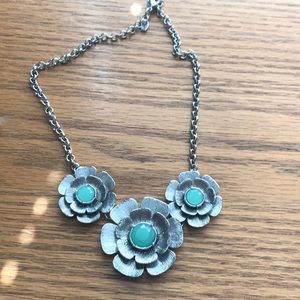 Flower pendant necklace.